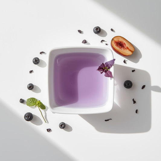 cup of purple tea showing flavor clarity in minimalist setup