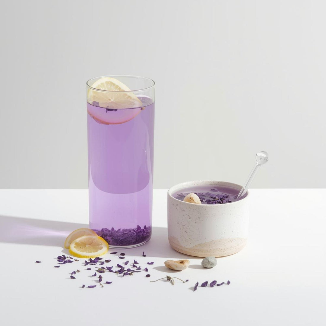 purple tea in clear glass highlighting mineral clarity